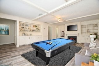 recreation room with hardwood / wood-style floors, beamed ceiling, coffered ceiling, and billiards