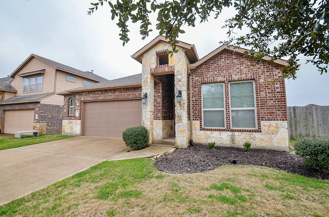 view of front facade with a garage and a front yard