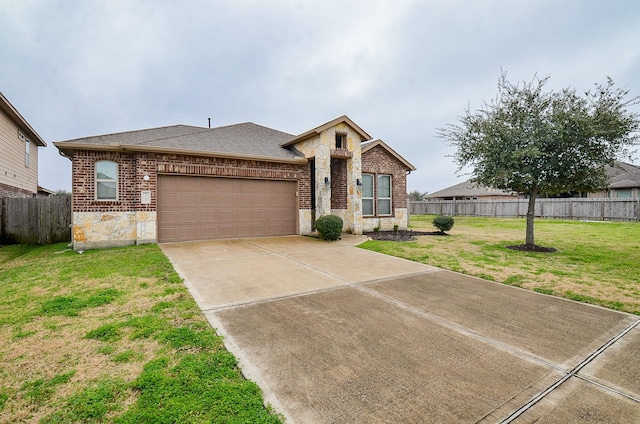 single story home featuring a garage and a front lawn