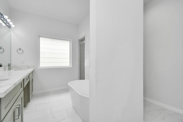 bathroom featuring vanity and separate shower and tub