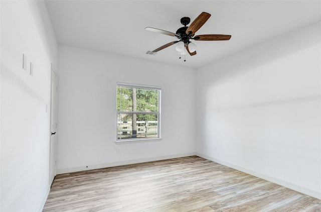 unfurnished room with ceiling fan and light wood-type flooring