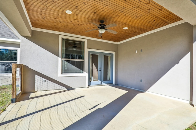 view of patio / terrace featuring french doors and ceiling fan