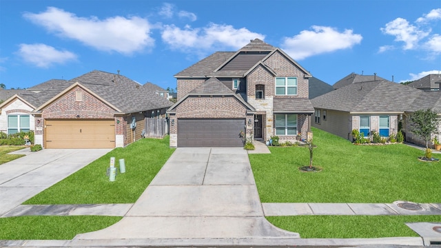 view of front facade featuring a front yard and a garage