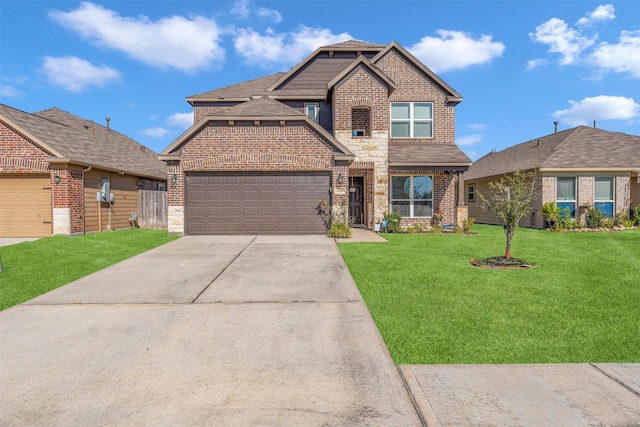 view of front of property with a garage and a front yard