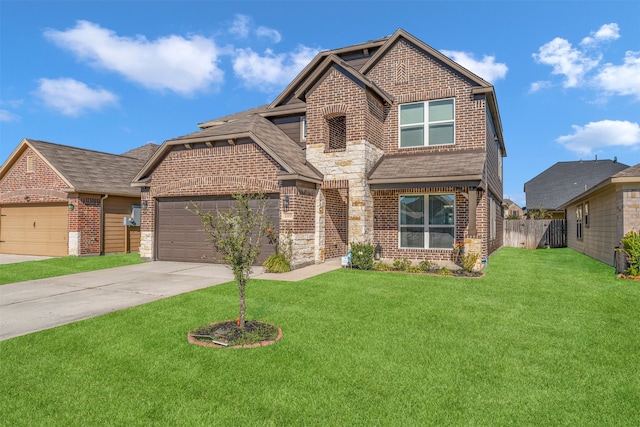 view of front of home featuring a front yard and a garage