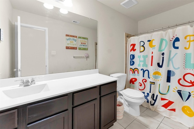 bathroom with vanity, toilet, tile patterned floors, and curtained shower