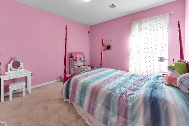 bedroom with light carpet