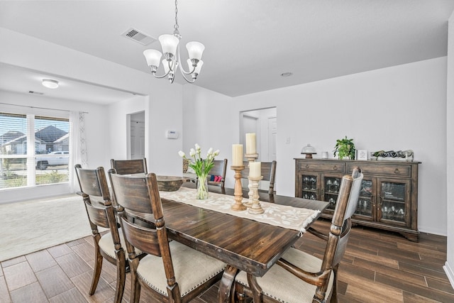 dining area with a chandelier