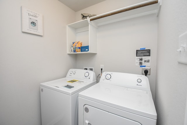 laundry area with washing machine and dryer