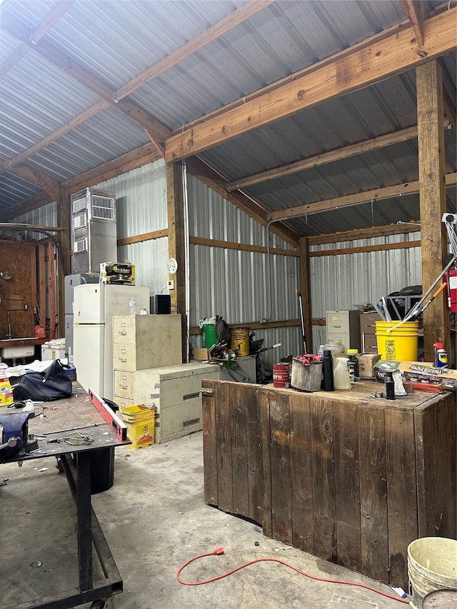 garage with white fridge