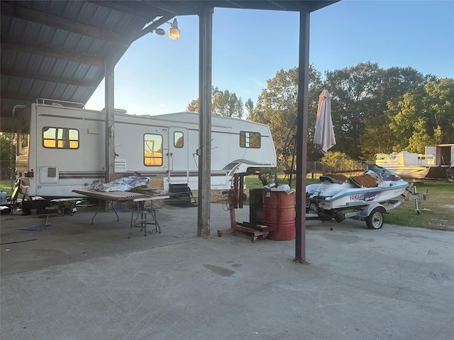 view of patio / terrace featuring a carport