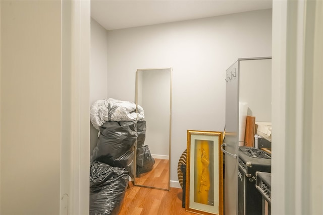 laundry room featuring hardwood / wood-style flooring