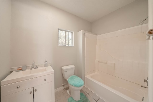 full bathroom featuring tile patterned flooring, vanity, toilet, and bathing tub / shower combination