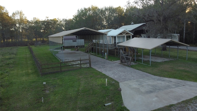 view of yard featuring a carport