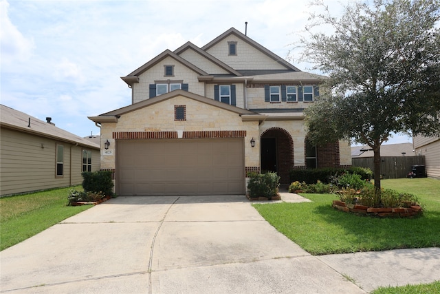 view of front facade featuring a garage and a front lawn