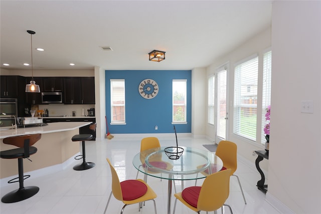 view of tiled dining space