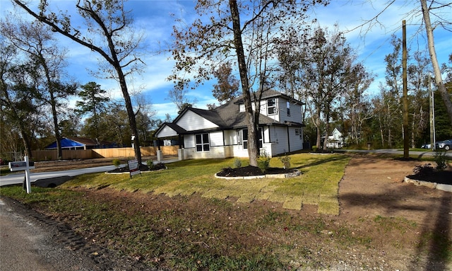 view of property exterior featuring a yard