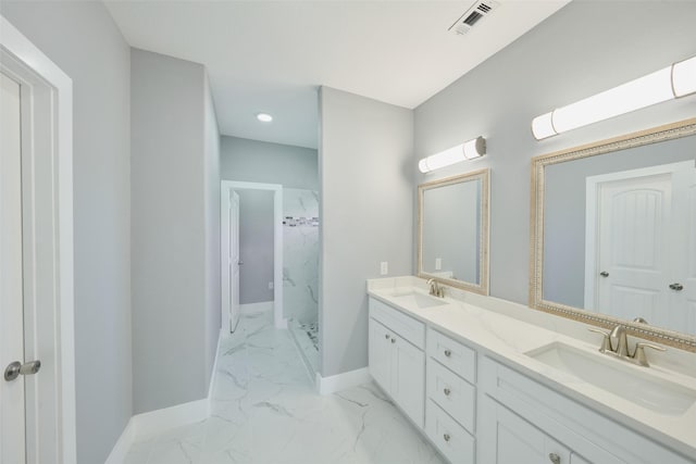 bathroom featuring vanity and walk in shower