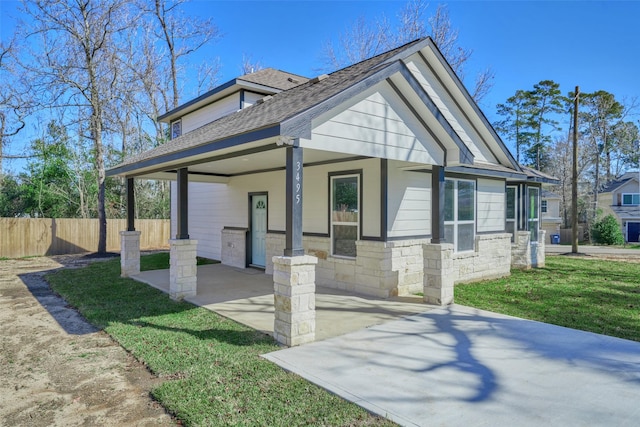 exterior space with a yard and a carport