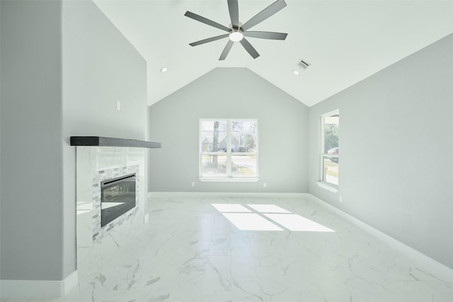 unfurnished living room with a fireplace, high vaulted ceiling, and ceiling fan