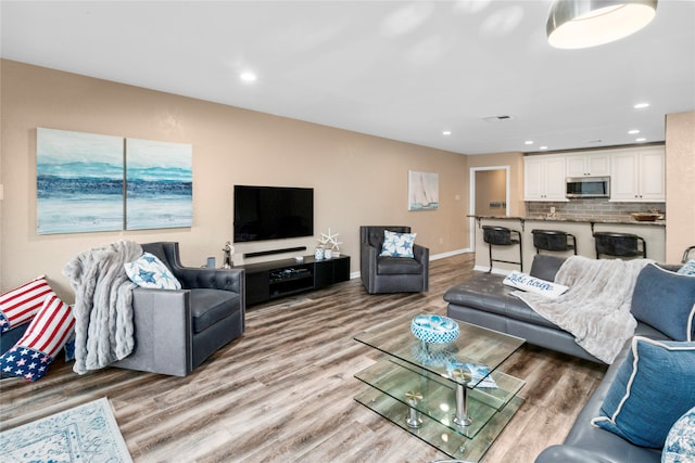 living room featuring hardwood / wood-style flooring