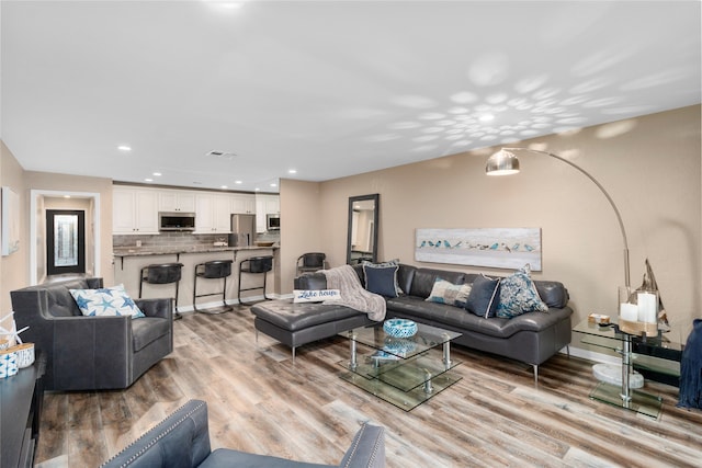 living room featuring light wood-type flooring