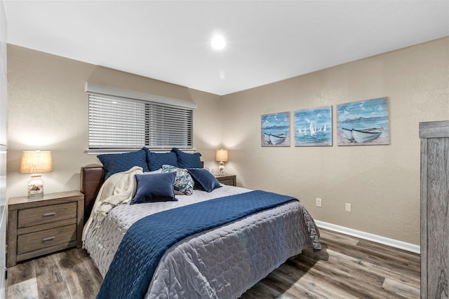 bedroom featuring dark wood-type flooring