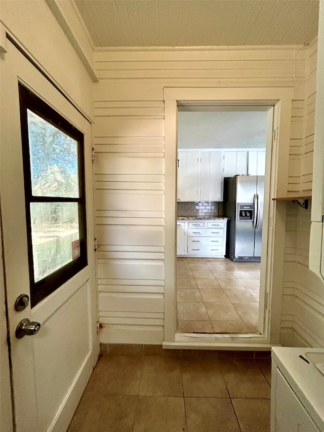 entryway featuring tile patterned flooring