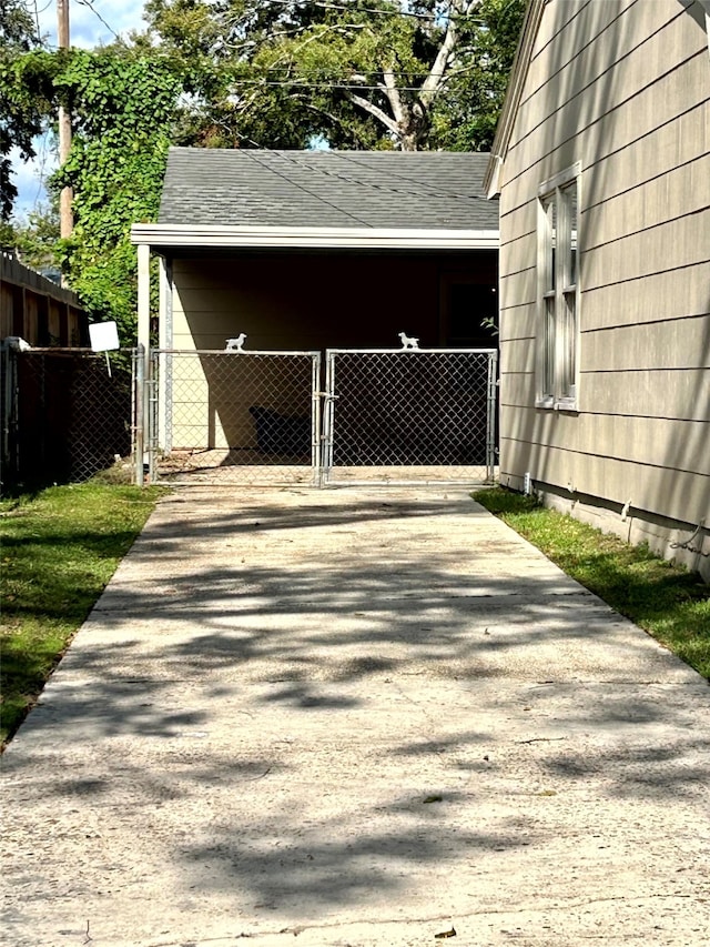 exterior space featuring a carport