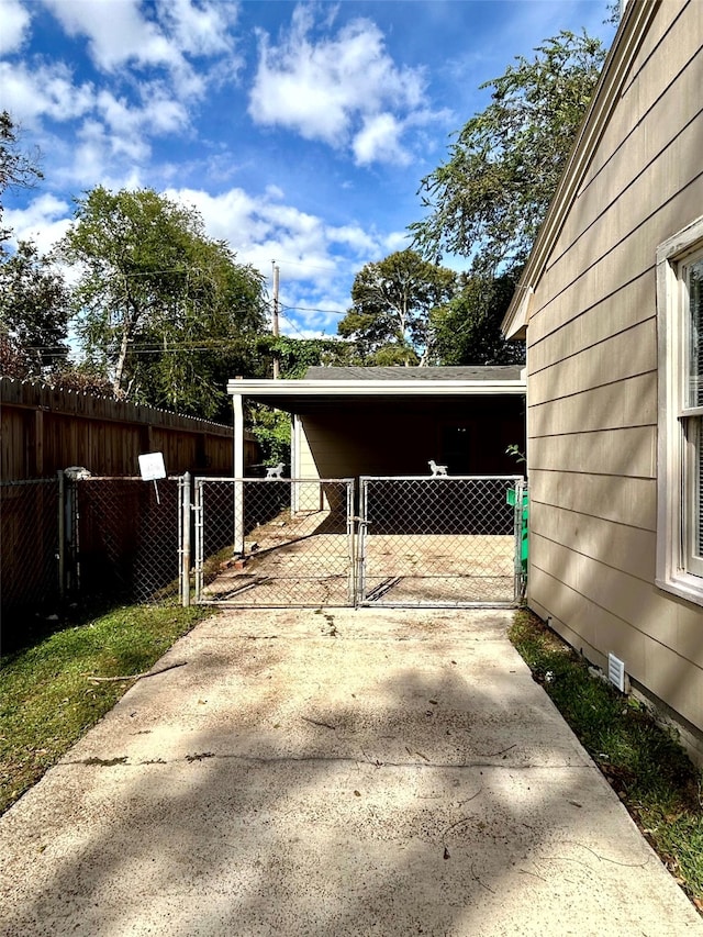 exterior space featuring a carport