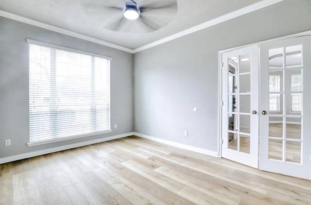 unfurnished room featuring ceiling fan, ornamental molding, light hardwood / wood-style flooring, and french doors