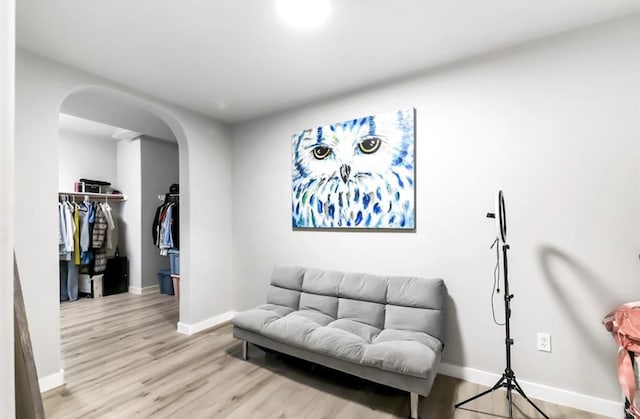 sitting room featuring light hardwood / wood-style floors