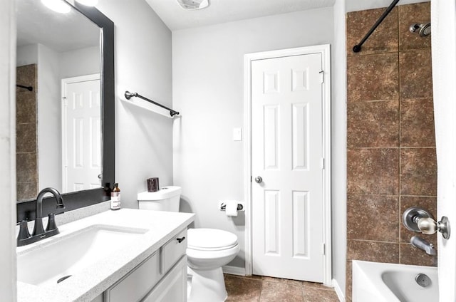 full bathroom with vanity, toilet, and tiled shower / bath