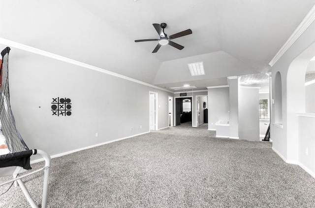 unfurnished living room featuring carpet flooring, crown molding, ceiling fan, and lofted ceiling