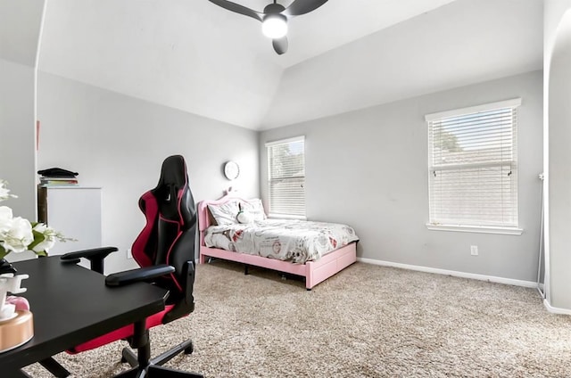 bedroom featuring multiple windows, ceiling fan, carpet, and vaulted ceiling