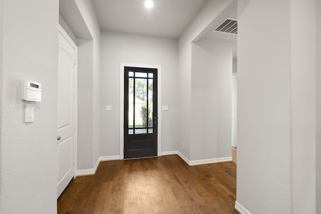 entryway with hardwood / wood-style flooring