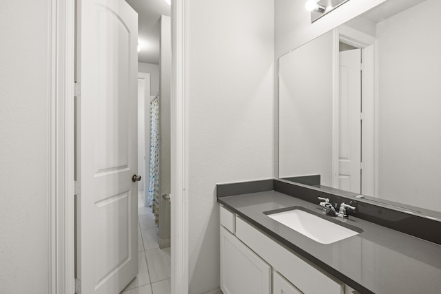 bathroom featuring vanity and tile patterned floors