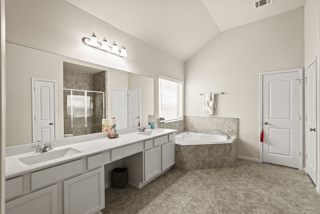 bathroom featuring separate shower and tub, tile patterned flooring, vanity, and vaulted ceiling