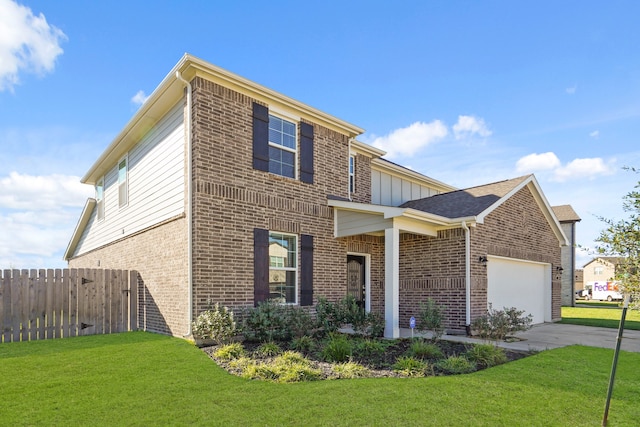 view of front of property with a garage and a front lawn