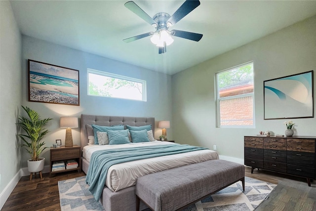 2222 Peppermill Rd, Houston, TX 77080 - bedroom with multiple windows, wood finished floors, and baseboards