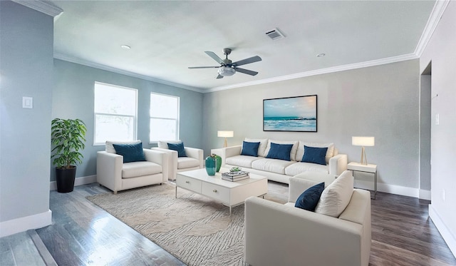 living room featuring ceiling fan, dark hardwood / wood-style flooring, and ornamental molding