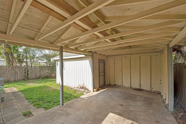 exterior space with vaulted ceiling