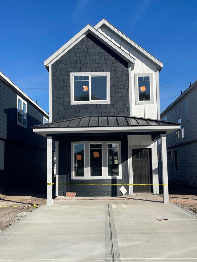 view of front of home featuring covered porch