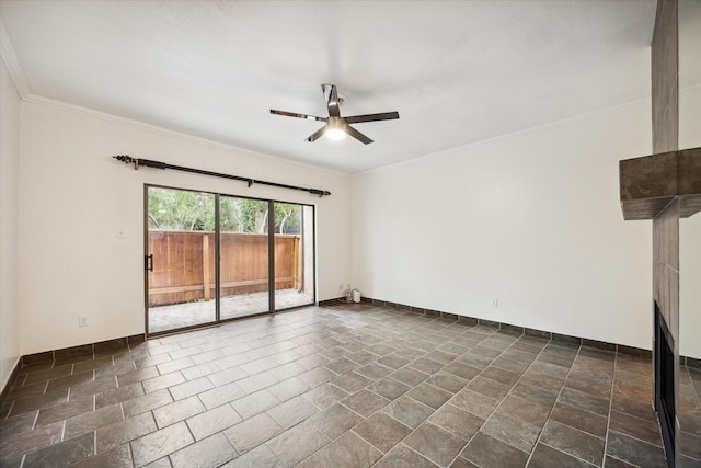 11711 Memorial Dr Unit 291, Houston, TX 77024 - spare room featuring baseboards, ornamental molding, a ceiling fan, and stone tile flooring