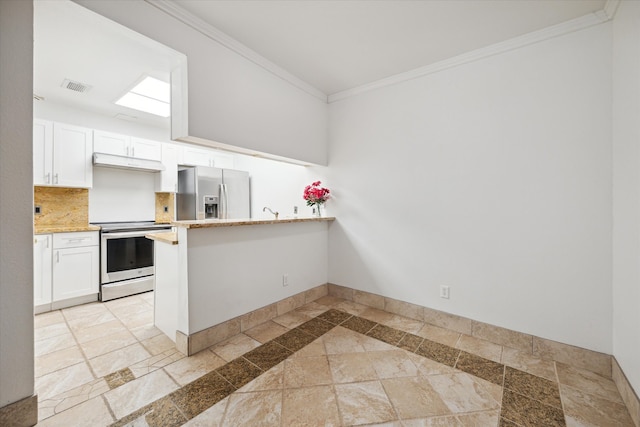 kitchen with crown molding, decorative backsplash, appliances with stainless steel finishes, white cabinetry, and kitchen peninsula