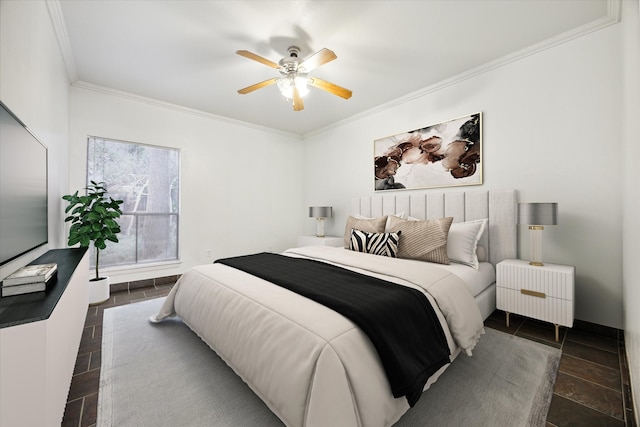 bedroom with ceiling fan and crown molding