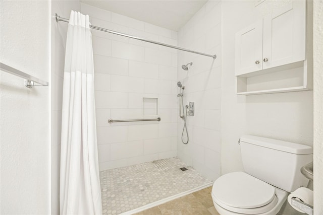 11711 Memorial Dr Unit 291, Houston, TX 77024 - bathroom with toilet and a shower stall