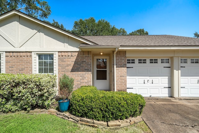 single story home with a garage