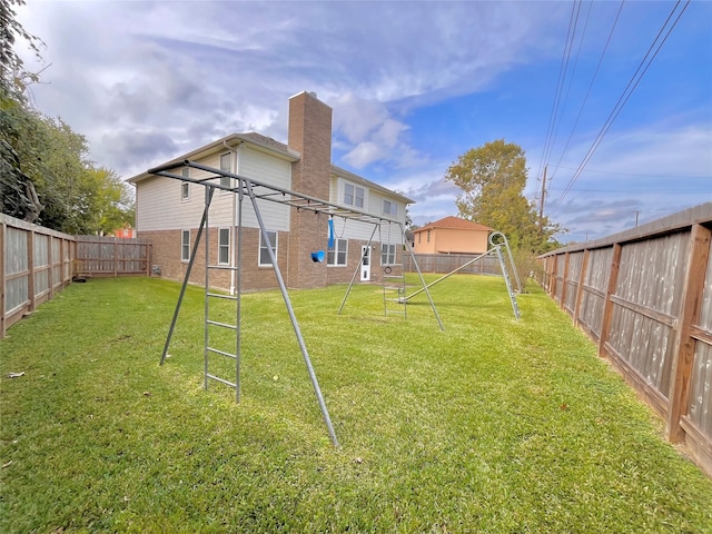 view of yard featuring a playground