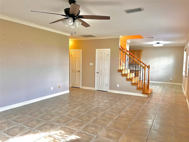 unfurnished room featuring ceiling fan and ornamental molding